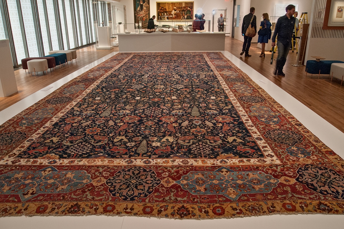 Large carpet in gallery.