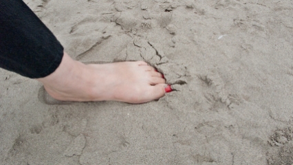 Foot in sand at Bluffer's park.